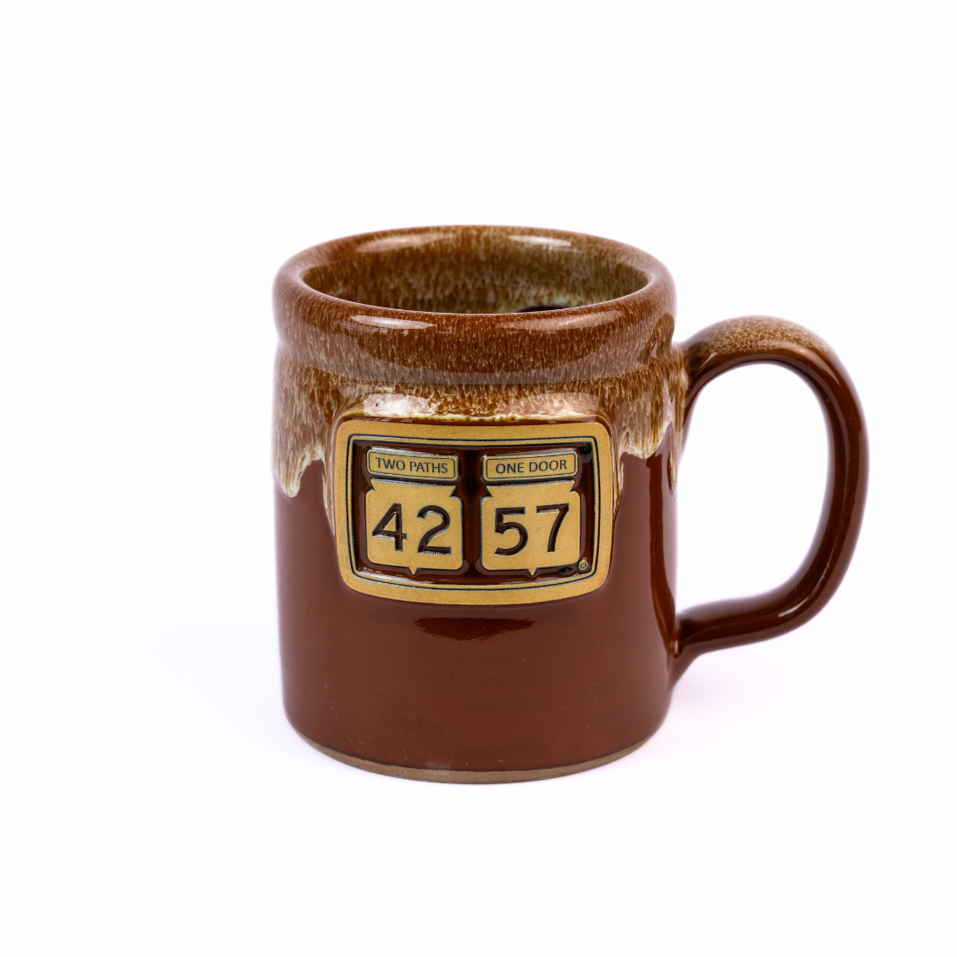 Tilted view of 42-57 Gallery Mug in brown made with handcrafted ceramic