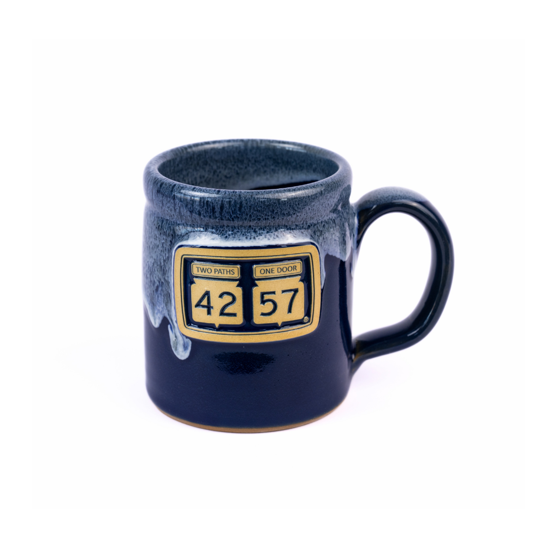 Tilted view of 42-57 Gallery Mug in navy made with handcrafted ceramic