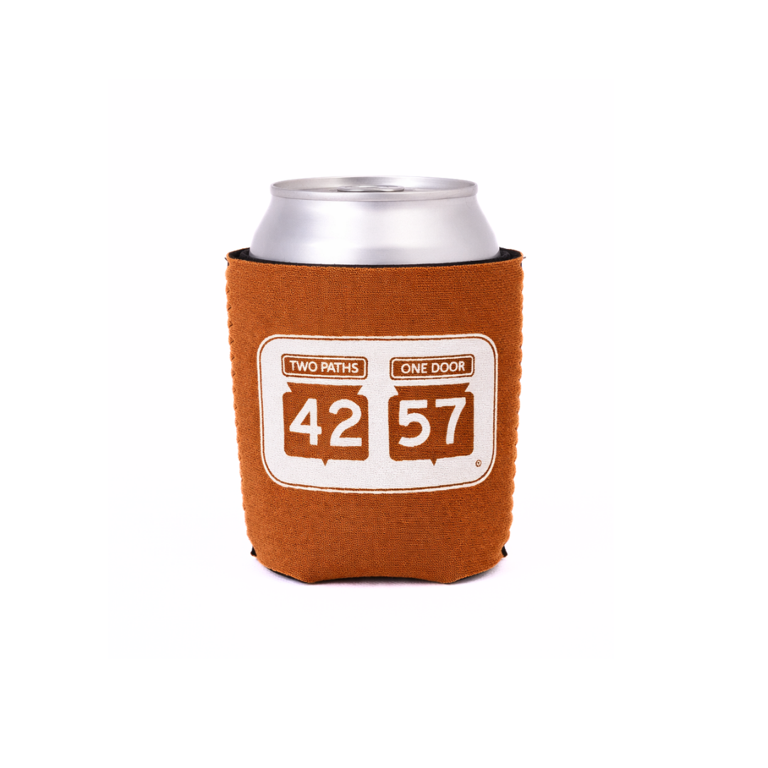 42-57 Standard Coozie in orange holding a 12 oz can