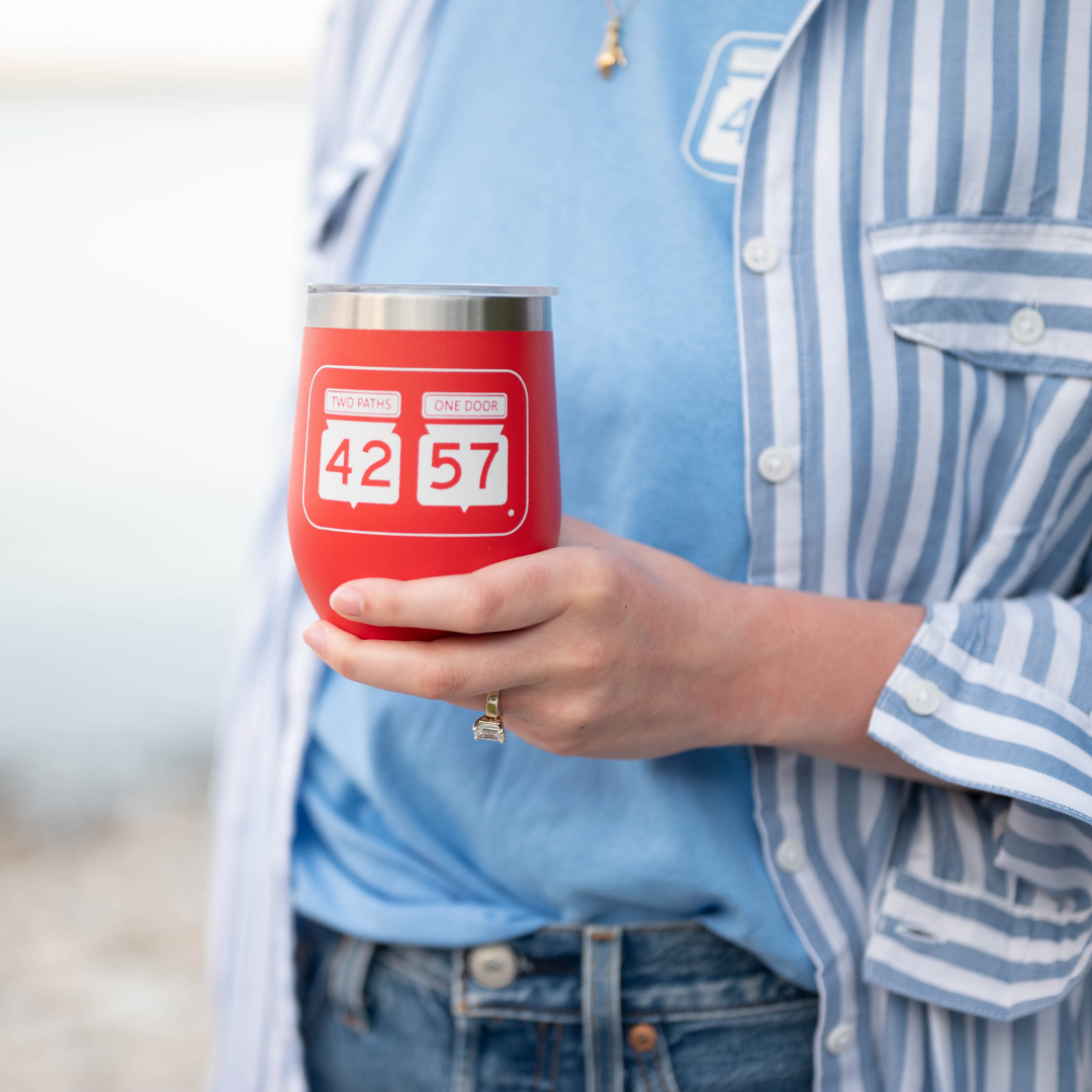 Person holding 42-57 Wine Tumbler in Door County, Wisconsin