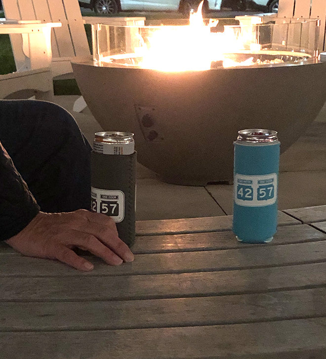 42-57 coozies in front of the fire