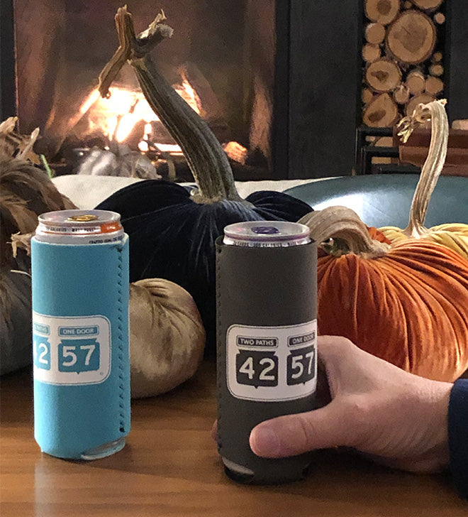 42-57 coozies in front of the fire